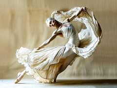 Ballet Dancer
 by Midjourney prompt :
 an artistic image shows a ballet dancer i…